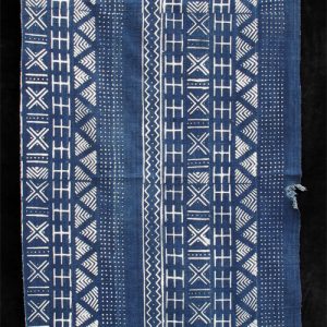 Indigo resist-dyed strip-weave cloth