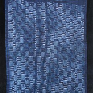 Indigo stitch-resist dyed strip-weave cloth
