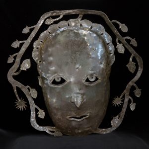 Large Face in the Foliage