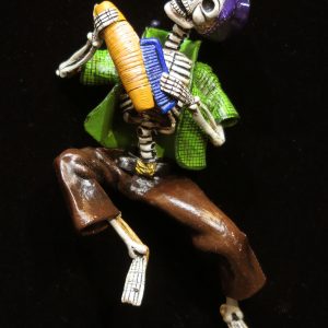 Calavera with Guiro - retablo figure
