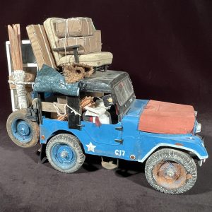 Blue Willys Jeep with Mother Teresa