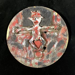 Horned Figure on a Cross